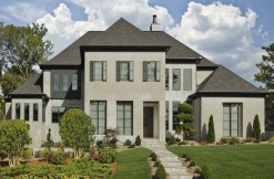 SouthPark modern luxury home under a blue Carolina sky.